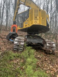 Forestry excavator used for land clearing and forest management tasks.